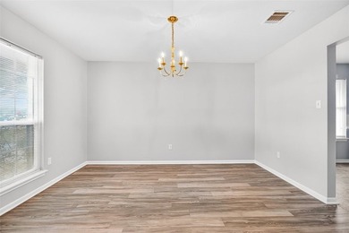 WELL CARED FOR all brick home on large tree shaded lot with new - photo 6