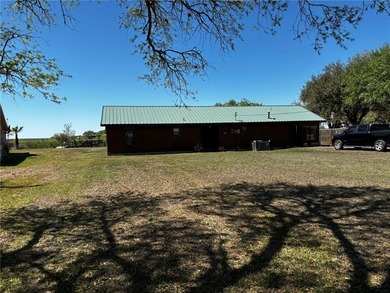 Lakefront Living with Endless Potential! Whether you're looking - photo 1