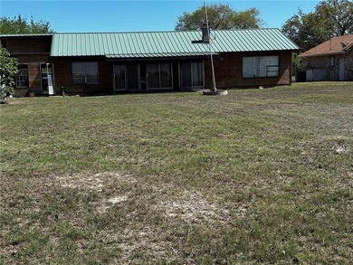 Lakefront Living with Endless Potential! Whether you're looking - photo 2