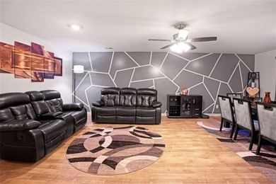 Welcome to effortless living in a serene Hampton neighborhood