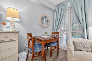 This fully furnished second floor condo located in the Grand - photo 11