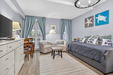 This fully furnished second floor condo located in the Grand - photo 12