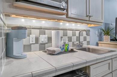This fully furnished second floor condo located in the Grand - photo 21