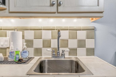 This fully furnished second floor condo located in the Grand - photo 22