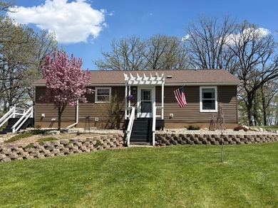 Nestled on 1.5 beautifully maintained acres, this charming 2 - photo 1
