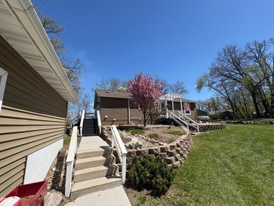 Nestled on 1.5 beautifully maintained acres, this charming 2 - photo 2
