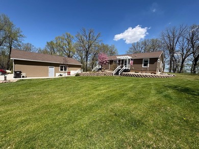 Nestled on 1.5 beautifully maintained acres, this charming 2 - photo 3