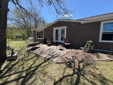 Nestled on 1.5 beautifully maintained acres, this charming 2 - photo 5