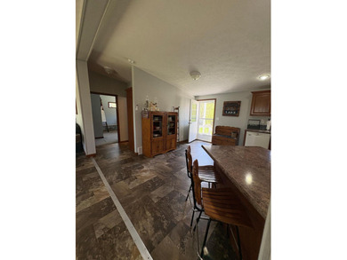 Nestled on 1.5 beautifully maintained acres, this charming 2 - photo 8