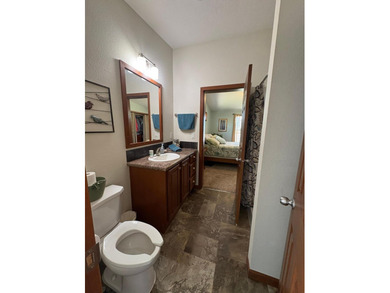 Nestled on 1.5 beautifully maintained acres, this charming 2 - photo 10
