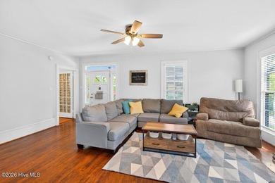 Step into the charm and character of downtown living in this - photo 4