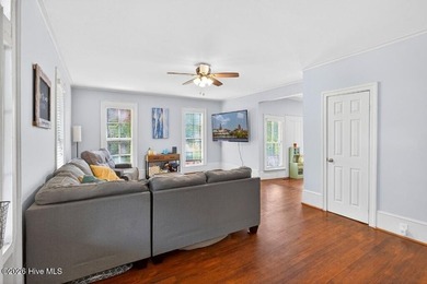 Step into the charm and character of downtown living in this - photo 5