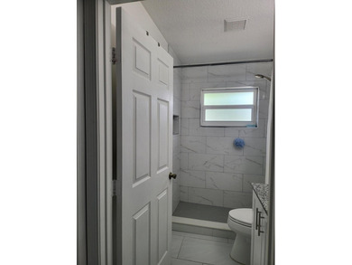 CBS home 3/2 located on a large corner lot! Split floor plan - photo 19