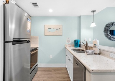 Located in the heart of Baytowne Wharf, this turnkey 5th-floor - photo 12