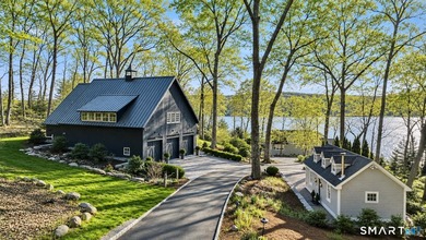 Perched above the CT River with breathtaking panoramic views and - photo 3