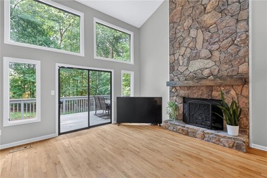 Tucked away on nearly an acre in the highly sought-after - photo 6