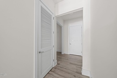 Hidden gem on Centennial Campus! This first-floor condo offers - photo 6