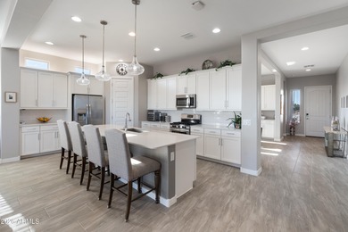 Experience elevated living in this gated 55+ community. This