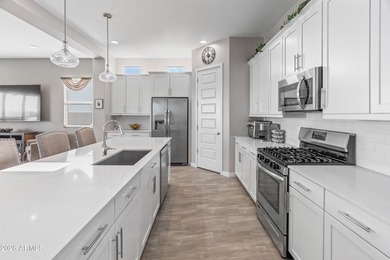 Experience elevated living in this gated 55+ community. This