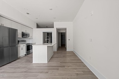 Hidden gem on Centennial Campus! This first-floor condo offers - photo 10