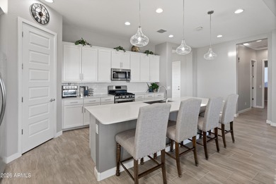 Experience elevated living in this gated 55+ community. This