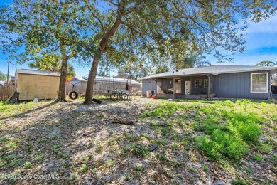 Opportunity awaits with this 4 bedroom, 2 bathroom home in Palm - photo 3