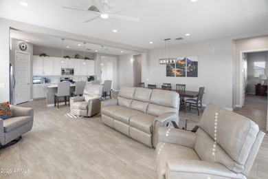 Experience elevated living in this gated 55+ community. This