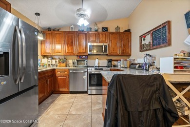 Opportunity awaits with this 4 bedroom, 2 bathroom home in Palm - photo 9