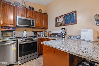 Opportunity awaits with this 4 bedroom, 2 bathroom home in Palm - photo 10