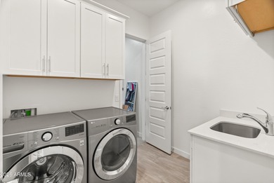 Experience elevated living in this gated 55+ community. This