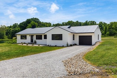 Discover the perfect blend of country living, recreation, and - photo 1
