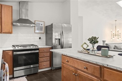 Tucked away in a peaceful setting, this three-bedroom - photo 12