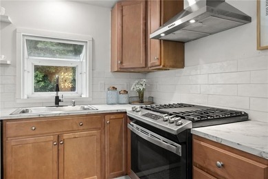 Tucked away in a peaceful setting, this three-bedroom - photo 15