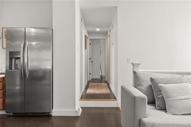Tucked away in a peaceful setting, this three-bedroom - photo 17