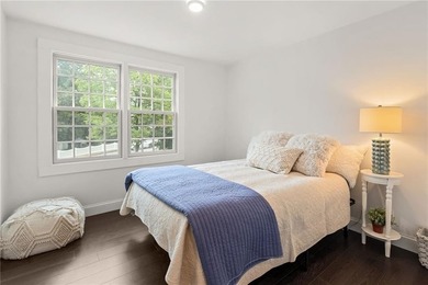 Tucked away in a peaceful setting, this three-bedroom - photo 20