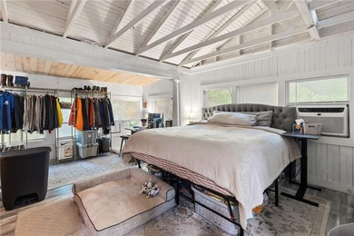 Tucked away in a peaceful setting, this three-bedroom - photo 23