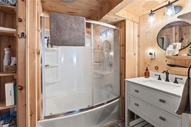 Tucked away in a peaceful setting, this three-bedroom - photo 25