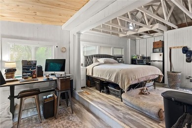Tucked away in a peaceful setting, this three-bedroom - photo 27