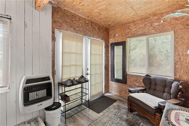Tucked away in a peaceful setting, this three-bedroom - photo 28