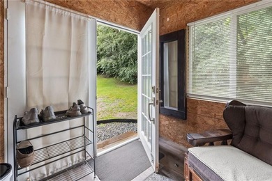 Tucked away in a peaceful setting, this three-bedroom - photo 30