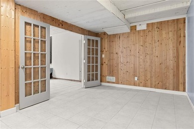 Tucked away in a peaceful setting, this three-bedroom - photo 39