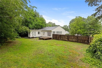 Tucked away in a peaceful setting, this three-bedroom - photo 45