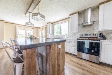 Acreage near the lake! Newer home and option to purchase dock. - photo 17