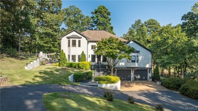 Nestled on a private 2.41-acre lot with an additional 1.51-acre