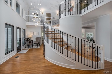 Nestled on a private 2.41-acre lot with an additional 1.51-acre