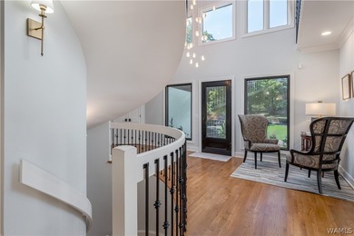 Nestled on a private 2.41-acre lot with an additional 1.51-acre