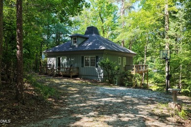 Charming lake retreat w/ 2-beds 2-baths on the main floor as - photo 1