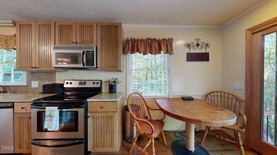 Charming lake retreat w/ 2-beds 2-baths on the main floor as - photo 9