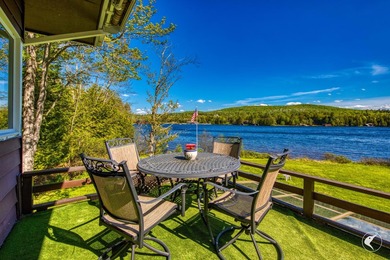 Set along the shoreline of Lower Saranac Lake within the - photo 14