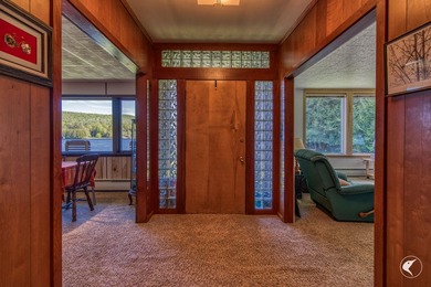 Set along the shoreline of Lower Saranac Lake within the - photo 15